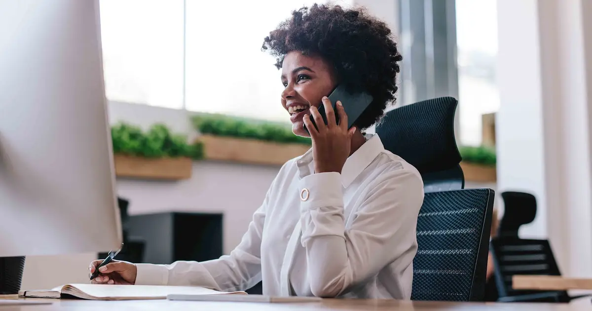 Smiling woman talking on the phone