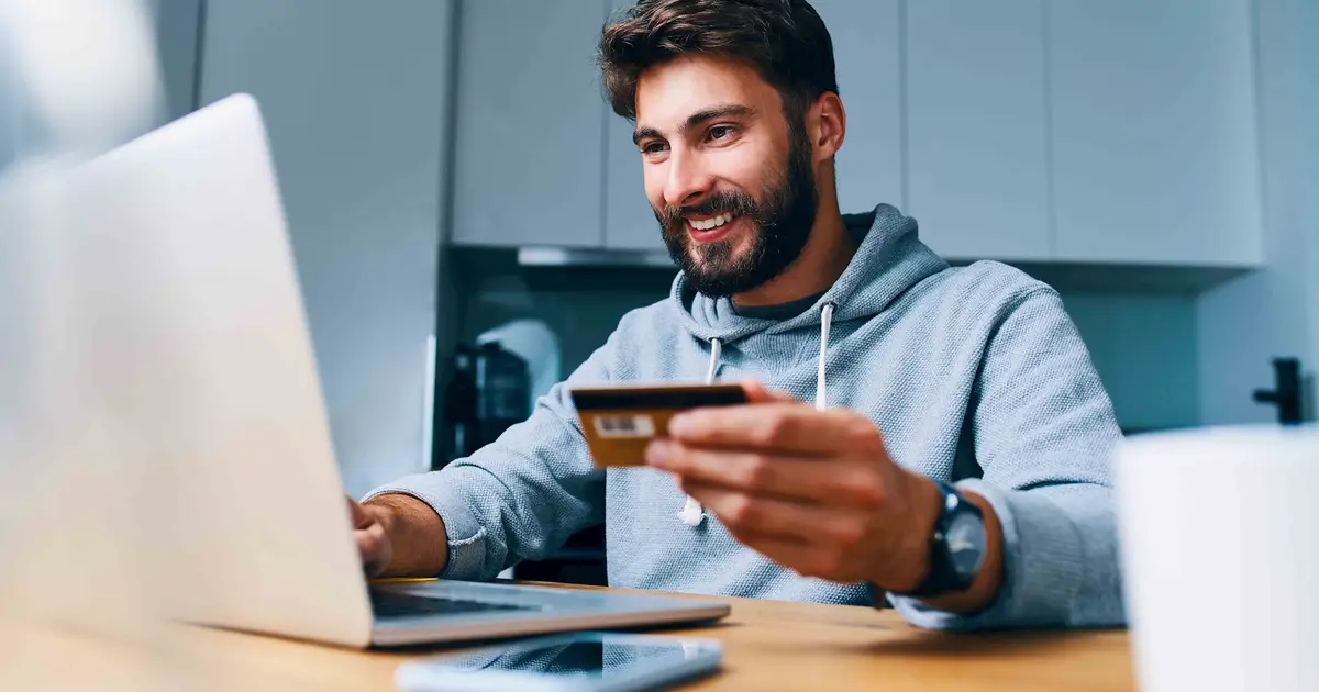 Man holding credit card.