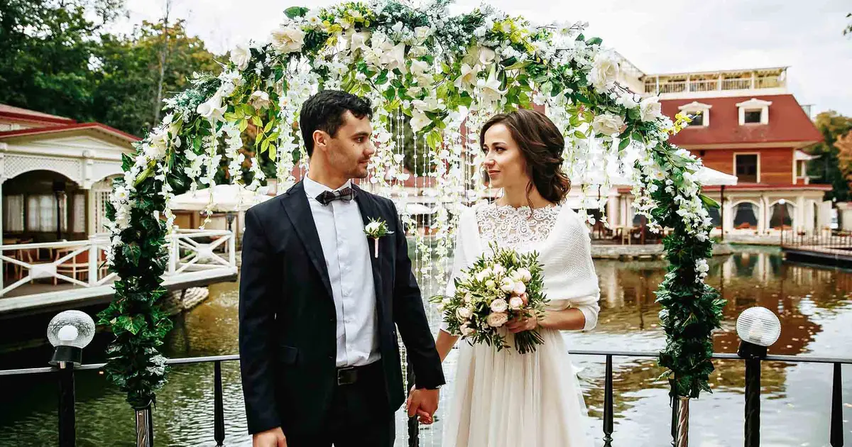 Bride and groom at waterfront wedding.