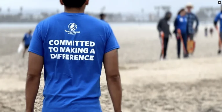 Mutual of Omaha Mortgage team participates in beach cleanup event.