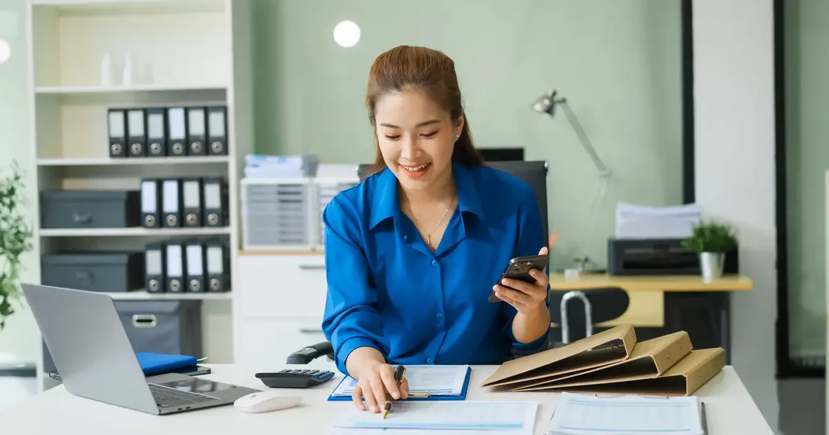 Young businesswoman at table